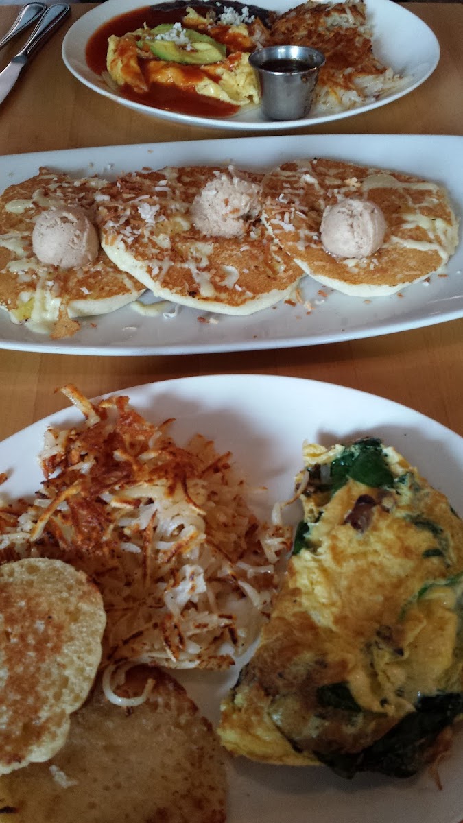 hubby's gluten meal on the left. Hawaiian GF pancakes center and my gf omelet/muffin on the right.