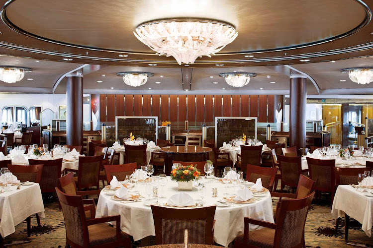 The tastefully appointed Crystal Dining Room aboard Crystal Symphony.