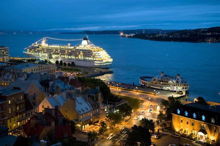 Crystal Symphony docks in Quebec City, Canada, at dusk.