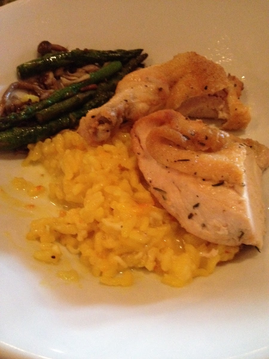 Risotto, pan seared chicken and wild mushrooms with asparagus.