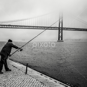 Winter fishing by José Borges - Black & White Street & Candid