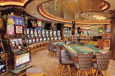 Step into Casino Royale aboard Jewel of the Seas and try your luck at several slot machines and card table games.