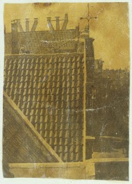 Stadsgezicht in Amsterdam gezien vanaf het huis van de fotograaf