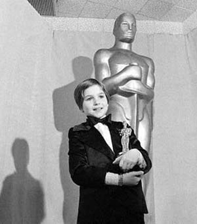 Tatum O Neal winning the Academy Award for Best Supporting Actress in 1974