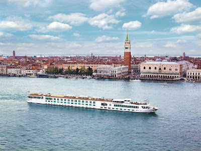 The award-winning boutique river cruise ship River Countess sails through the Grand Canal in Venice. 