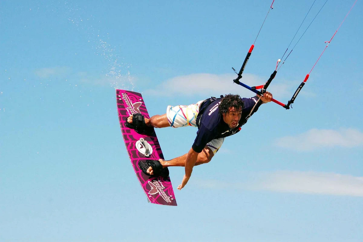 Morph-Kiteboarding - A kiteboarder catches some air along the coast of Mexico. Try it or just watch at Morph Kiteboarding in Tulum or El Cuyo, Yucatán. 
