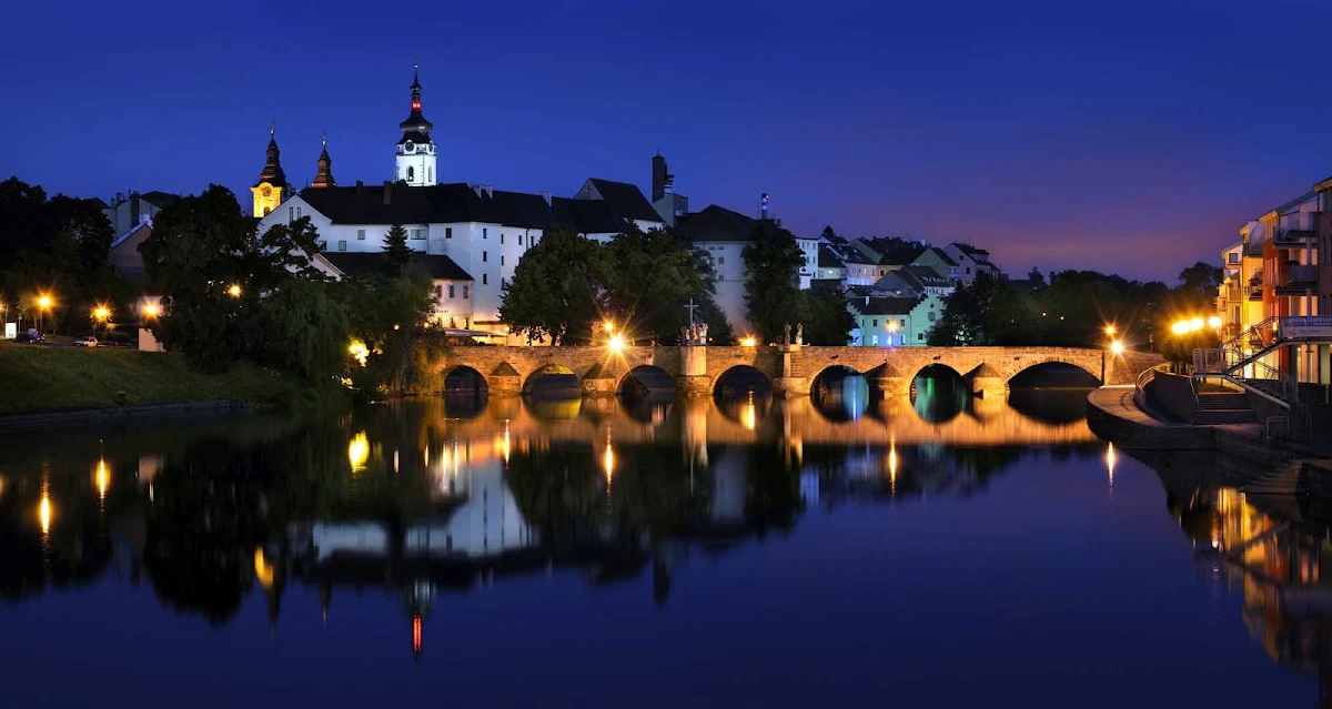 Czech-Pisek-Stone-Bridge - Stroll across the 14th-century Pisek Stone Bridge, one of the oldest bridges in Central Europe, into the historic center of Pisek, the Czech Republic.