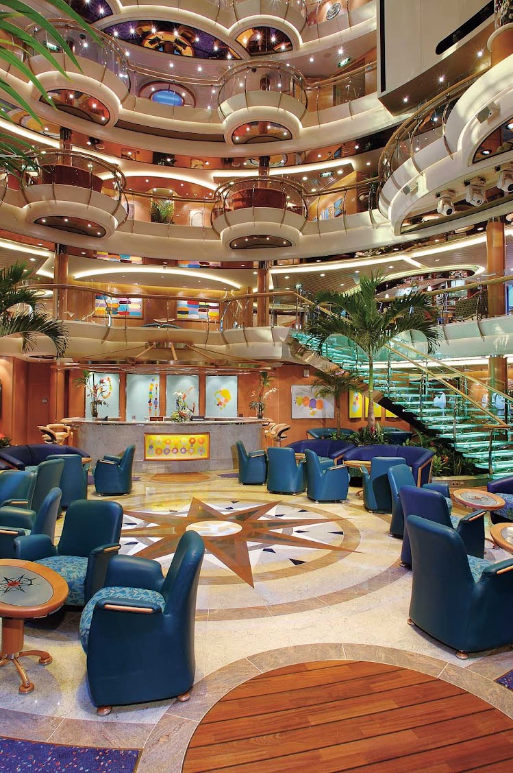 The Centrum aboard Jewel of the Seas, nine decks high, is adorned with fine décor, glass-sided elevators and stairs with a comfy lobby area.