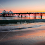 Sunset Over Malibu Pier by Andy Taber -  
