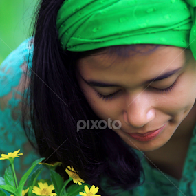 The Flower by A Friyana Wiradikarta - People Portraits of Women