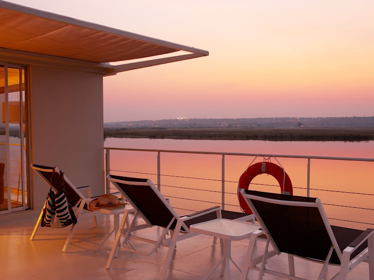Grab a deck chair — and perhaps your camera — to take in the sunset from aboard the Zambezi Queen. 
