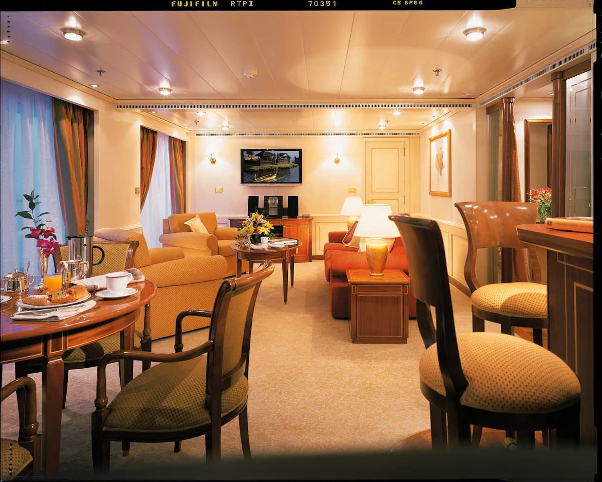 Silversea_Owners_Suite - The Owner's Suite appeals to those who want the most luxurious stateroom aboard Silver Shadow. It offers a large teak veranda, living room, separate dining area and bar, and a well-appointed bathroom.
