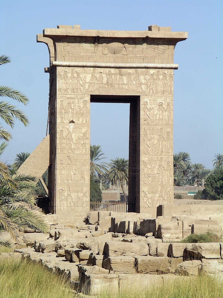 The Gateway of Ptolemy III Euergates I / Ptolemy IV Philopator of the Precinct of Montu at Luxor, Egypt. See it as part of a cultural experience on a river cruise.