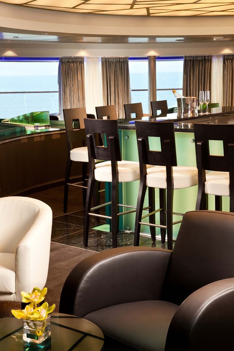 Panoramic views greet guests as they gather for early morning risers' coffee and tea in the Observation Bar on Seabourn Quest.