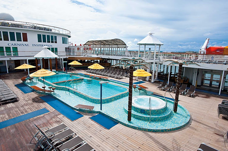 Join the family for a swim, or unwind with a tropical drink and a soak in one of the whirlpools on Carnival Inspiration's Lido pool deck.
