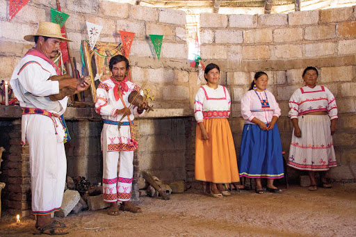 Performers in traditional Huichol costume near Puerto Vallarta, Mexico.