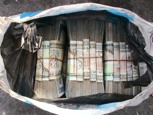 Bag of cash, money changer, Turkmenistan