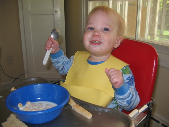 [David's first cheerios by himself 5-22 007.jpg]