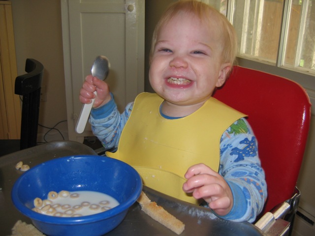 [David's first cheerios by himself 5-22 004.jpg]