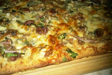 walnut, roasted red grape and balsamic onion pizza with sage bachamel