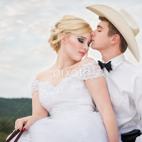 Cowboy bride and groom by Igor Photos.com - Wedding Bride & Groom