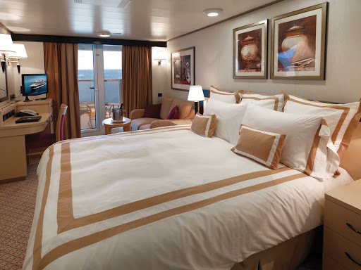 The Britannia Club Balcony Stateroom aboard Queen Elizabeth offers guests 24-hour room service, a selection of pillows and duvets, a spacious furnished private balcony and more.