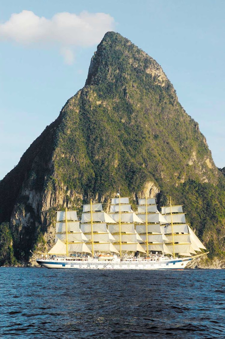 Royal Clipper offers guests awesome views of St. Lucia and the Pitons as it sails the island nation's coast.