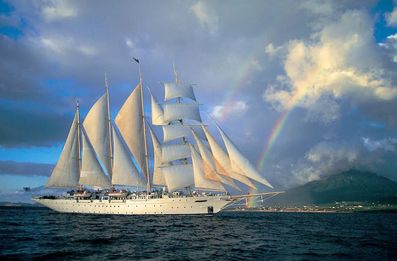 Guests enjoy a double rainbow during a sailing aboard Star Flyer. The clipper ship carries up to 170 passengers.
