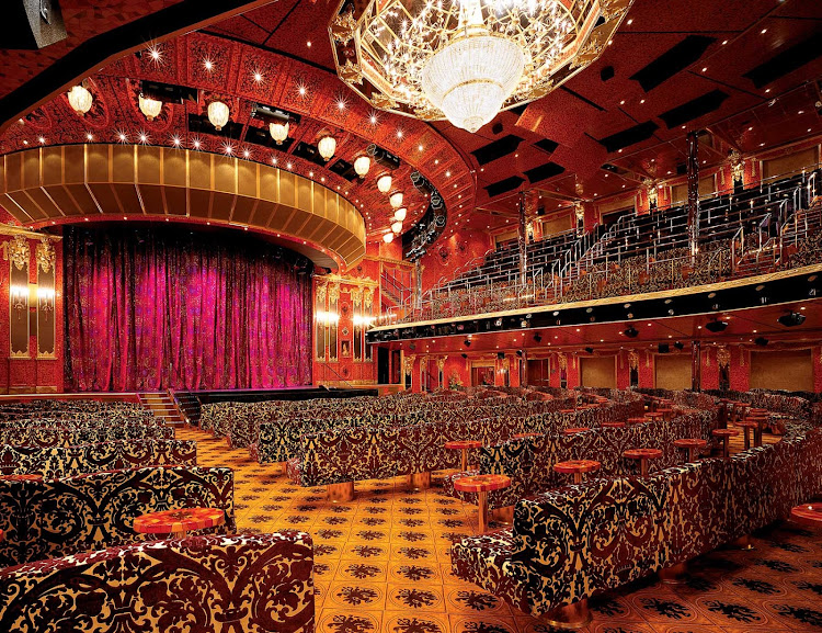 Enjoy Vegas-style shows at the multilevel Amber Palace, Carnival Glory's main entertainment venue.