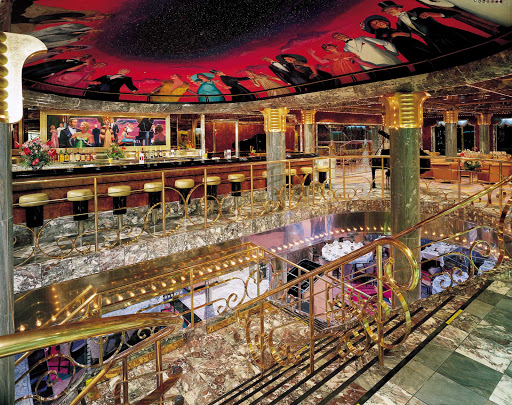Relax with a cocktail and meet new acquaintances at Carnival Ecstasy's Society Bar.