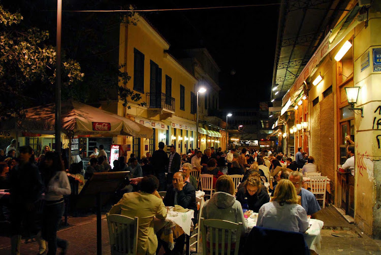 Nightime dining in the Plaka, Athens, Greece.