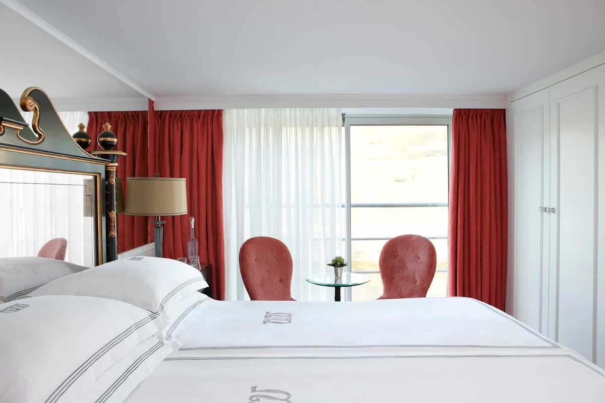 Uniworld-River-Princess-stateroom-bedding-2 - An impeccably presented River Princess stateroom will serve as your private sanctuary throughout your romantic cruise of Europe's rivers.