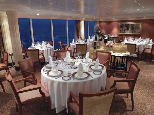 The expansive views and opulent dining room of Oceania Regatta's Toscana restaurant is a great setting to experience authentic Tuscan cuisine.