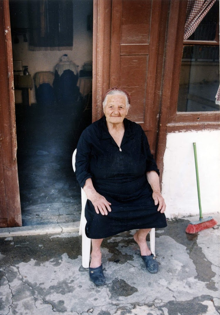 We were charmed by this townswoman, who let us take her photo on the front porch of her stucco house in Skalani, a small village in Crete. We were invited into the house of a nearby neighbor who had never before seen an American.