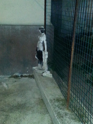 Statuetta In Angolo