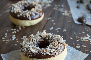 Coconut Donuts Topped with Chocolate Ganache and Toasted Coconut