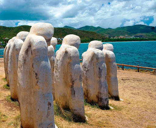 The Anse Cafard Slave Memorial, completed in 1998 in commemoration of the 150th anniversary of the emancipation of slaves in the French West Indies, is a poignant and artistic reminder of the island's history and heritage.