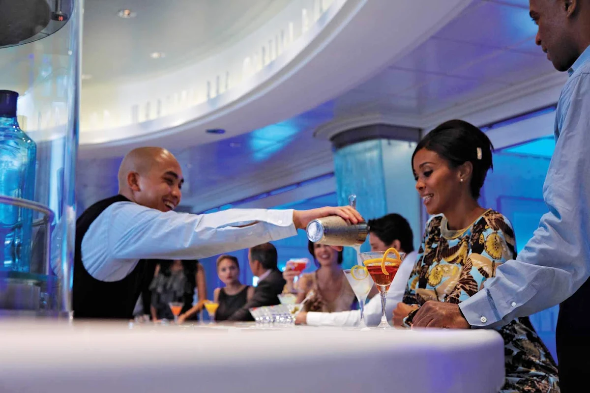 Celebrity_Equinox_MartiniBar - You'll be looked after by the attentive bar staff in Celebrity Equinox's Martini Bar.