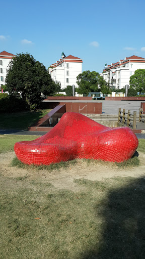 Sleeping Red Man Sculpture