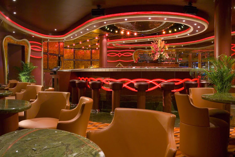 Sing along to your favorite tunes or just chill with a cocktail and some friends at Sam's, a lively piano bar on Carnival Dream.