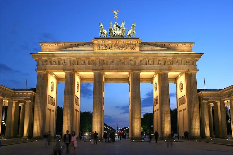 The Brandenburg Gate in the Moabit section of Berlin is a former city gate, rebuilt in the late 1700s as a neoclassical triumphal arch. It's one of Germany's best-known landmarks.