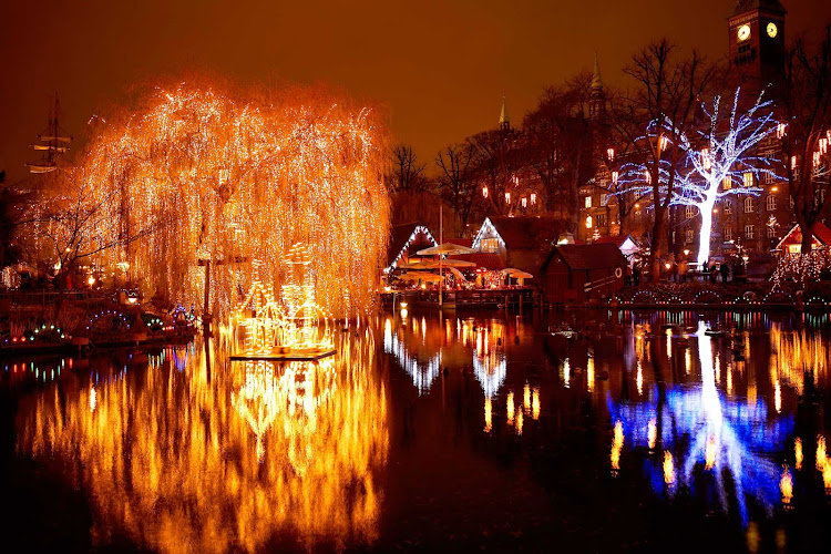 Christmastime in Copenhagen's Tivoli Lake, part of Tivoli Gardens, which opened in 1843, making it the second oldest amusement park in the world.