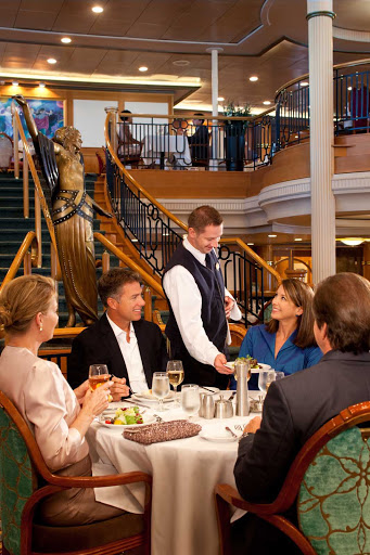 Grandeur of the Seas' two-level Great Gatsby Dining Room serves complimentary multi-course breakfasts, lunches and dinners.