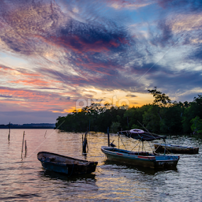 Boats under a Bornean Sky by Mahdi Hussainmiya - Landscapes Sunsets & Sunrises