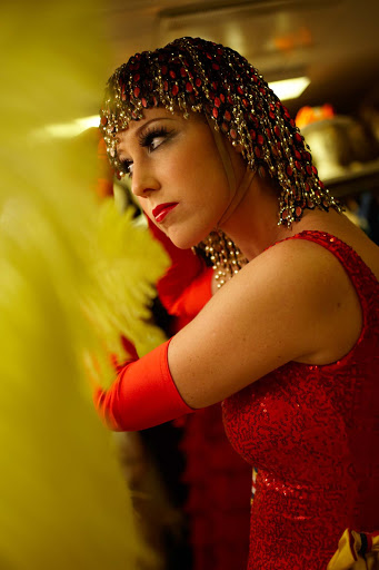 Backstage on a Crystal cruise, a dancer gets ready for an evening performance.