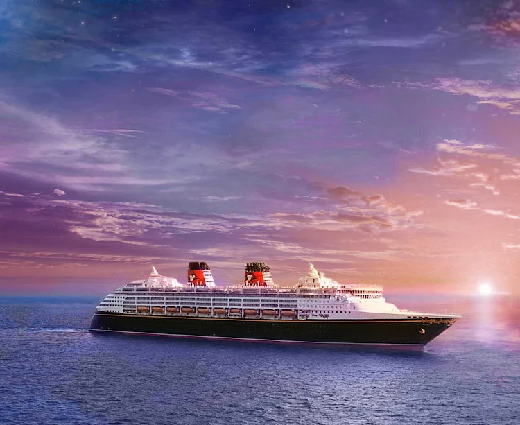 Disney Magic as sunset turns to a night sky in this composite photo.