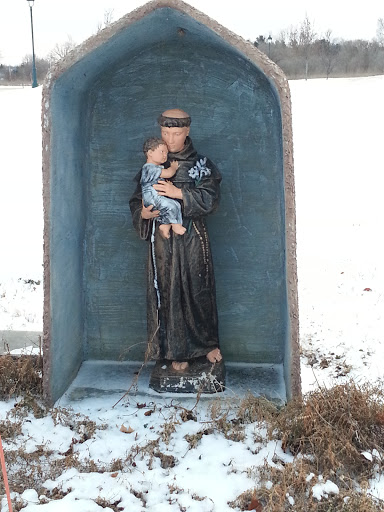 Friar and Child Sculpture