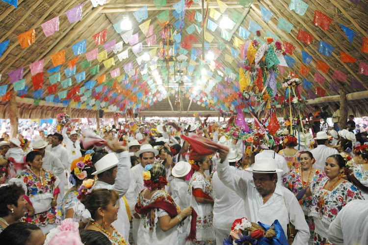 On Cozumel, you may be lucky enough to join the fun of the Festival of El Cedral.