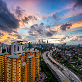 Highway heading towards city centre during sunset by Rithauddin Zpiritz - Buildings & Architecture Other Interior