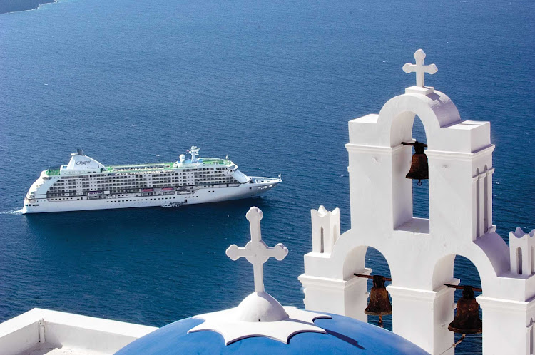 Travel on board Seven Seas Voyager and take a short hike to see breathtaking views of Santorini.